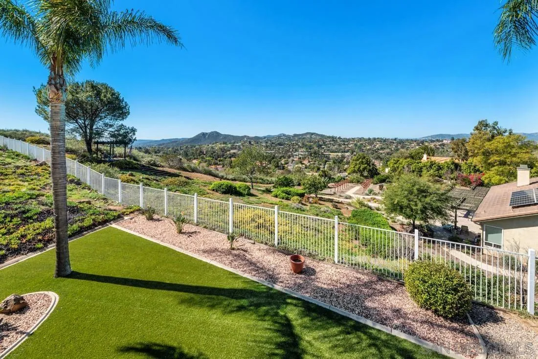 14513 Wildgrove Road Poway, CA 92064 - Photo 32 of 39 a view of a house with a garden and lake view