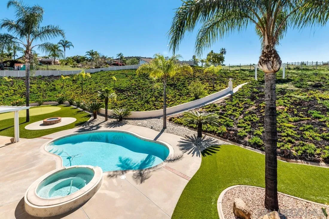 14513 Wildgrove Road Poway, CA 92064 - Photo 33 of 39 a view of a swimming pool with a patio