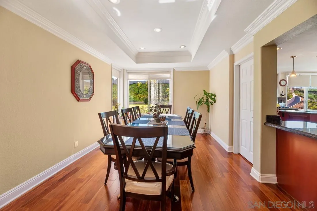 14513 Wildgrove Road Poway, CA 92064 - Photo 10 of 39 a view of a dining room with furniture window and wooden floor