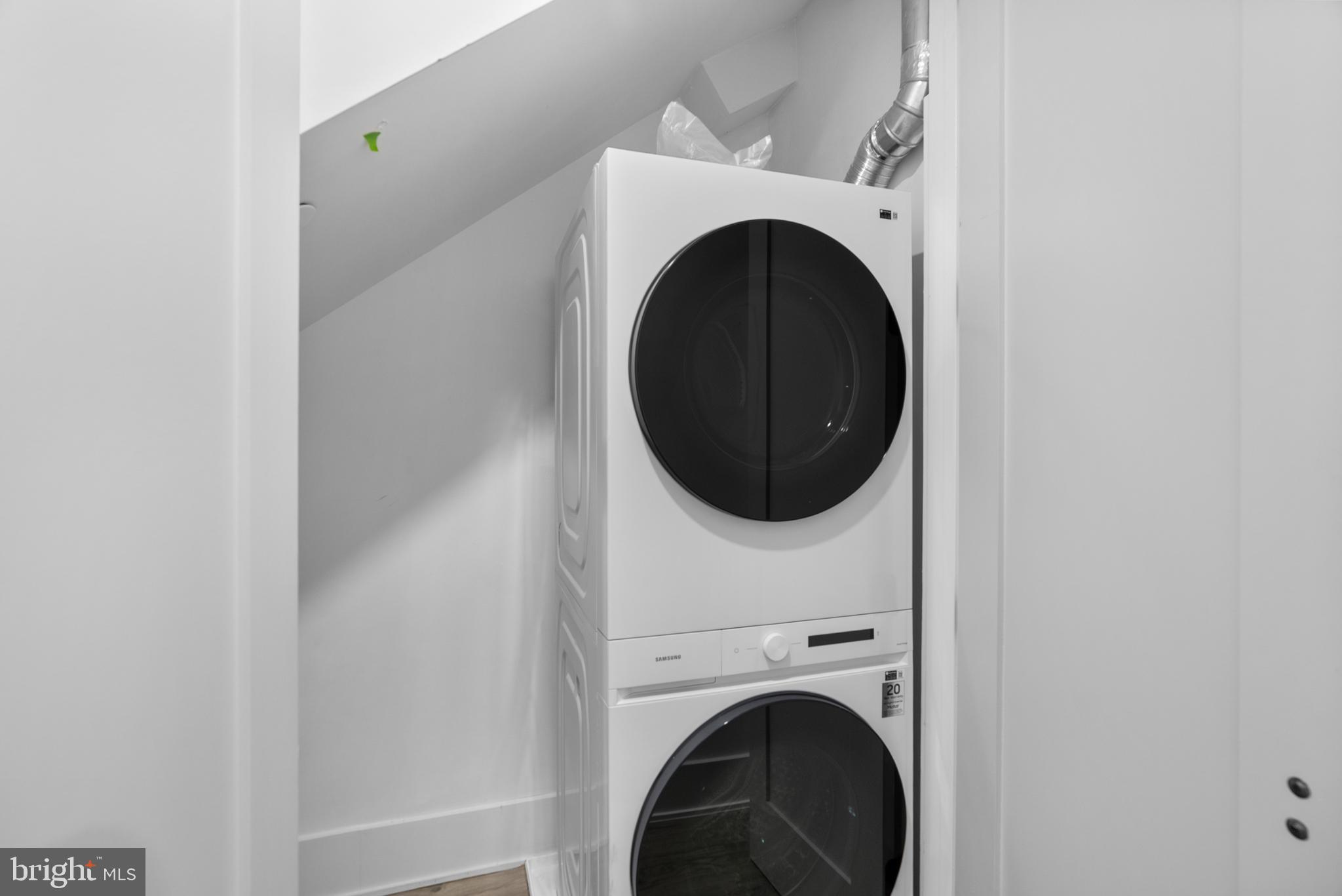 1140 Oates Street Northeast, Unit 102 Washington, DC 20002 - Photo 24 of 40 a close up view of a washer and dryer