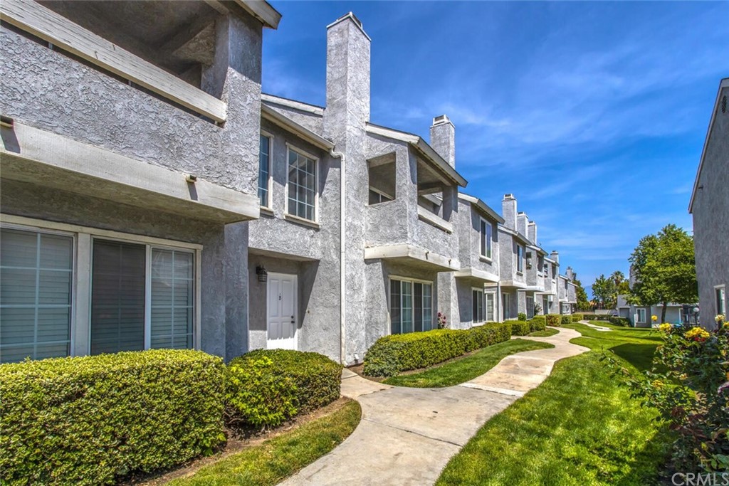 172 West Walnut Avenue, Unit B Rialto, CA 92376 - Photo 1 of 1 a view of a house with a yard