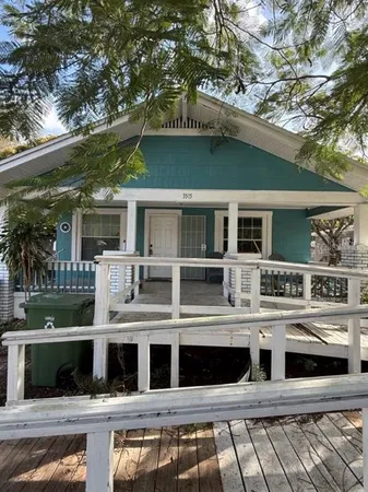 a view of a house with a street