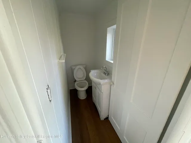 a bathroom with a sink and toilet