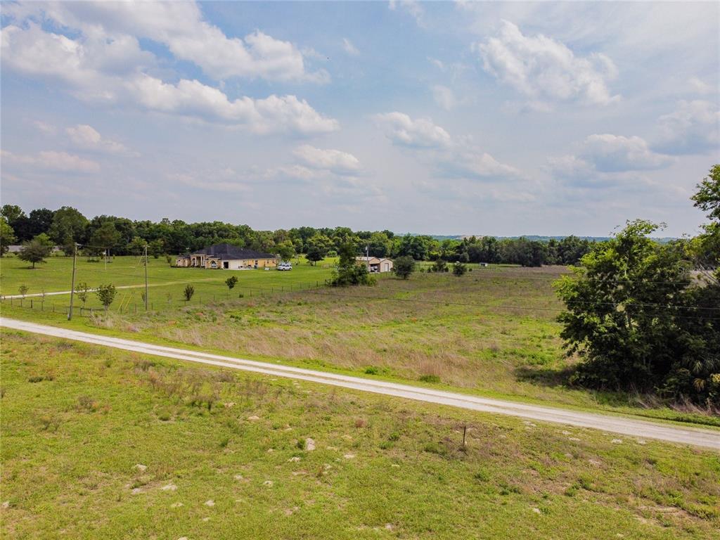 15434 Peach Bloom Road Brooksville, FL 34614 - Photo 1 of 1 a view of an ocean and city