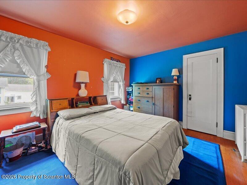 71 Pleasant Avenue Thompson, PA 18465 - Photo 20 of 37 a bed room with a bed and a window