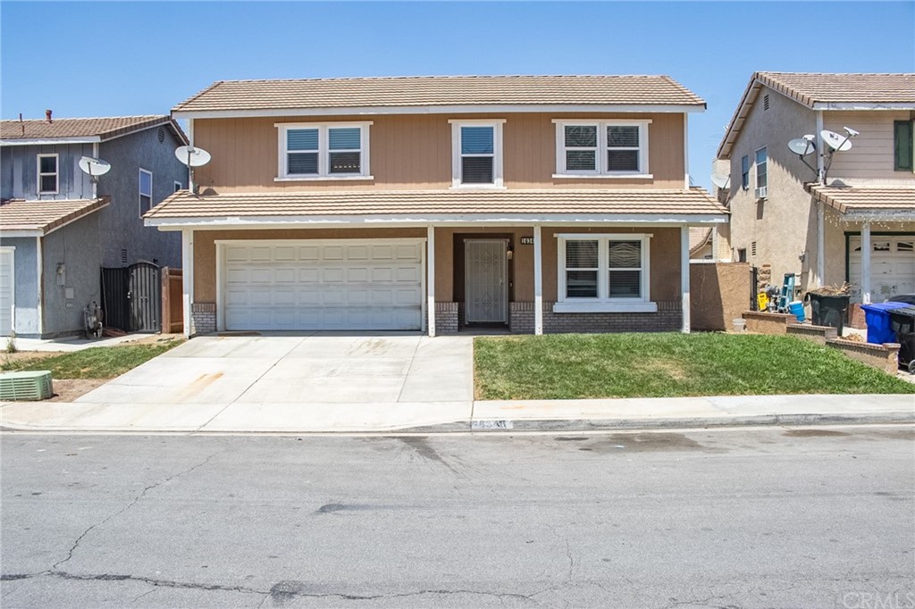 16348 Trelaney Road Fontana, CA 92337 - Photo 1 of 1 a front view of house with yard