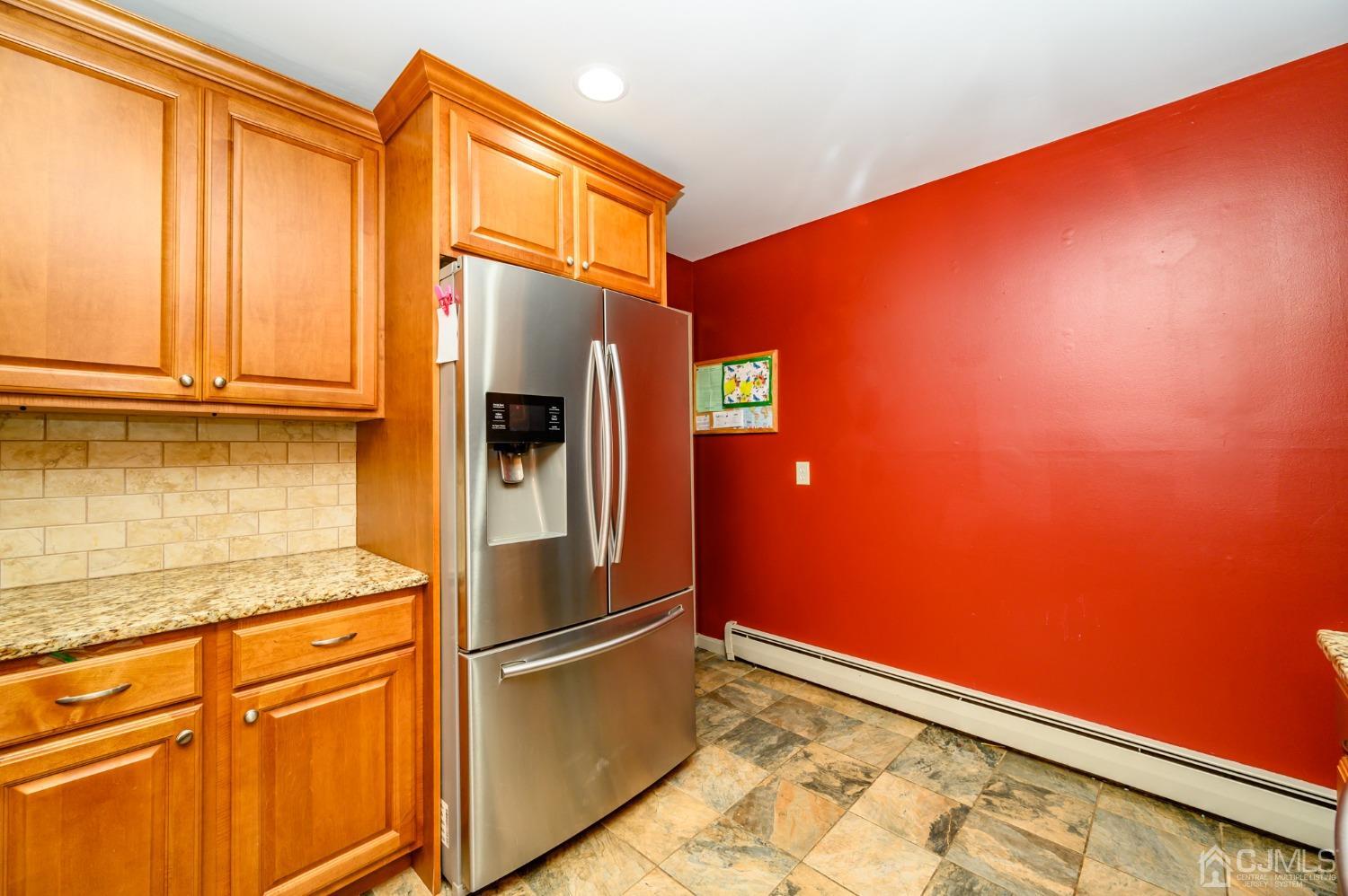 67 Hollow Road Glen Gardner, NJ 08826 - Photo 14 of 45 a kitchen with stainless steel appliances granite countertop a refrigerator and cabinets