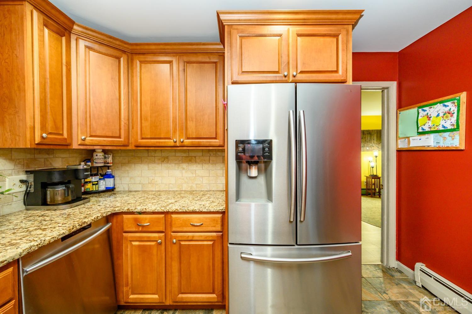 67 Hollow Road Glen Gardner, NJ 08826 - Photo 16 of 45 a kitchen with granite countertop stainless steel appliances a refrigerator and cabinets