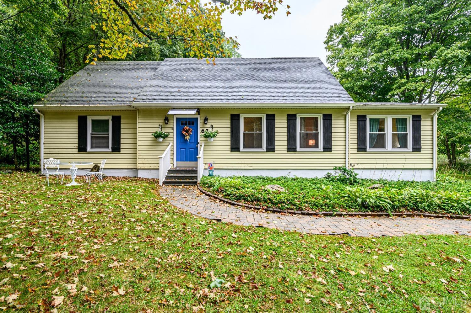 67 Hollow Road Glen Gardner, NJ 08826 - Photo 2 of 45 a front view of a house with garden
