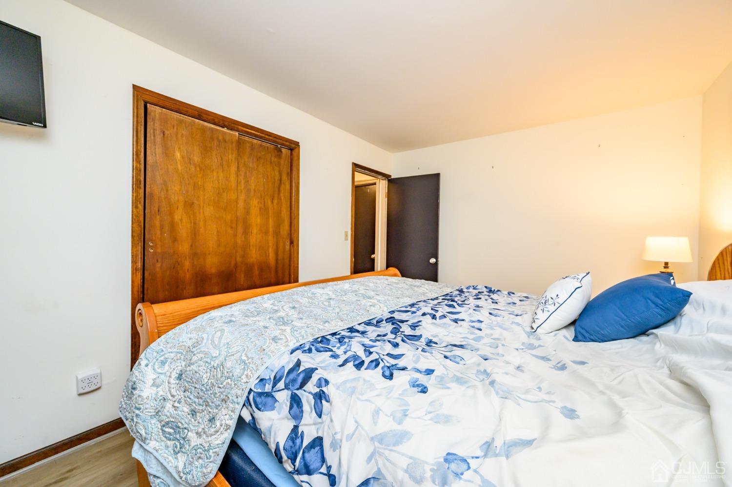 67 Hollow Road Glen Gardner, NJ 08826 - Photo 23 of 45 a bedroom with a bed and a window