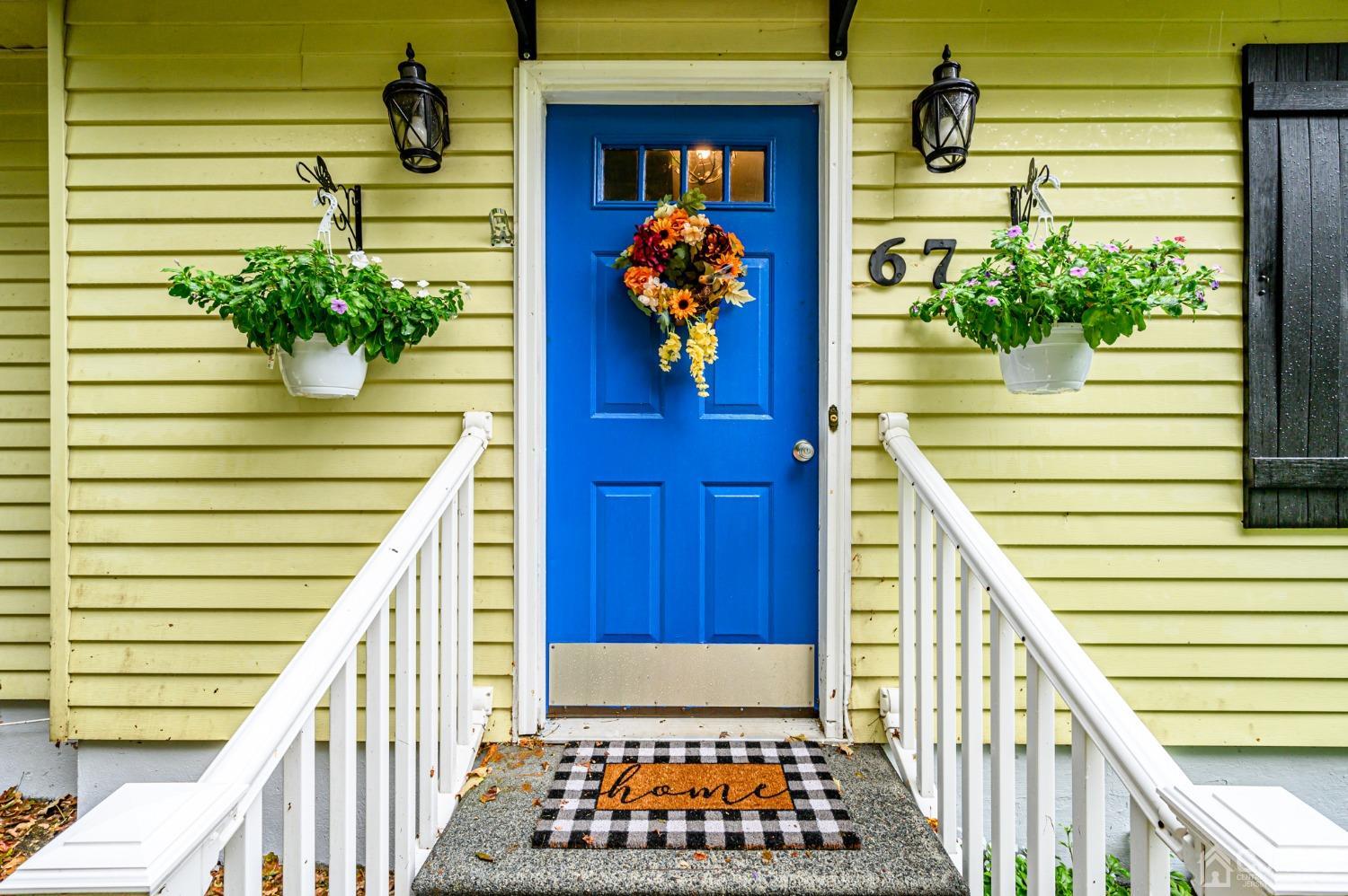 67 Hollow Road Glen Gardner, NJ 08826 - Photo 3 of 45 a view of a potted flower in front of a door