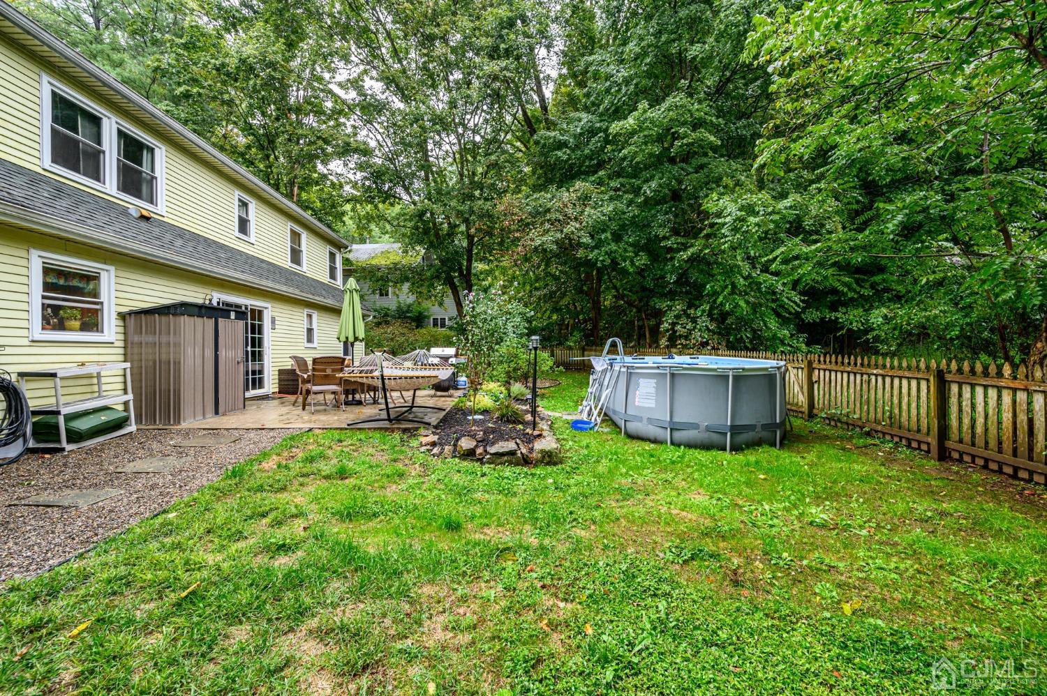67 Hollow Road Glen Gardner, NJ 08826 - Photo 36 of 45 a view of a house with backyard porch and sitting area