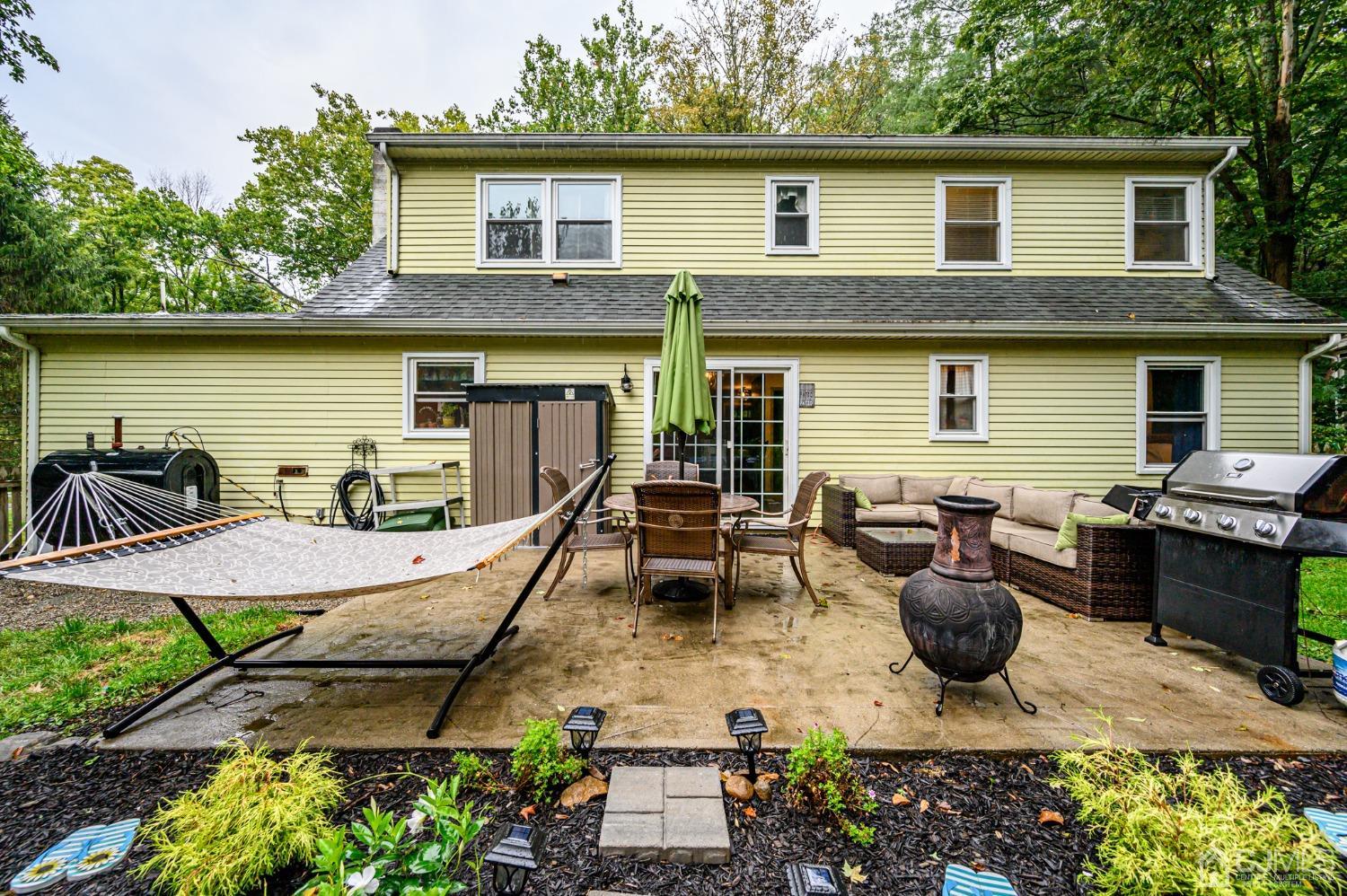 67 Hollow Road Glen Gardner, NJ 08826 - Photo 37 of 45 a view of a patio with chairs and plants
