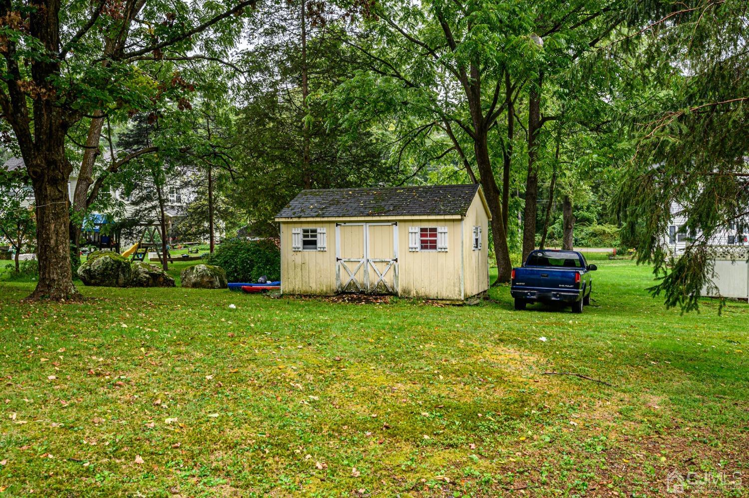 67 Hollow Road Glen Gardner, NJ 08826 - Photo 43 of 45 a house view with a garden space