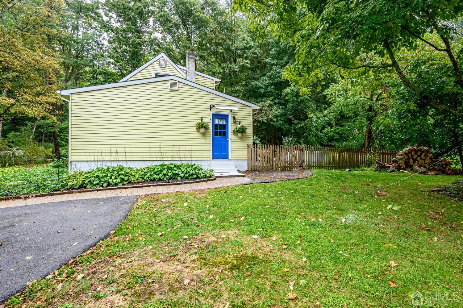 67 Hollow Road Glen Gardner, NJ 08826 - Photo 44 of 45 a front view of house with yard and green space