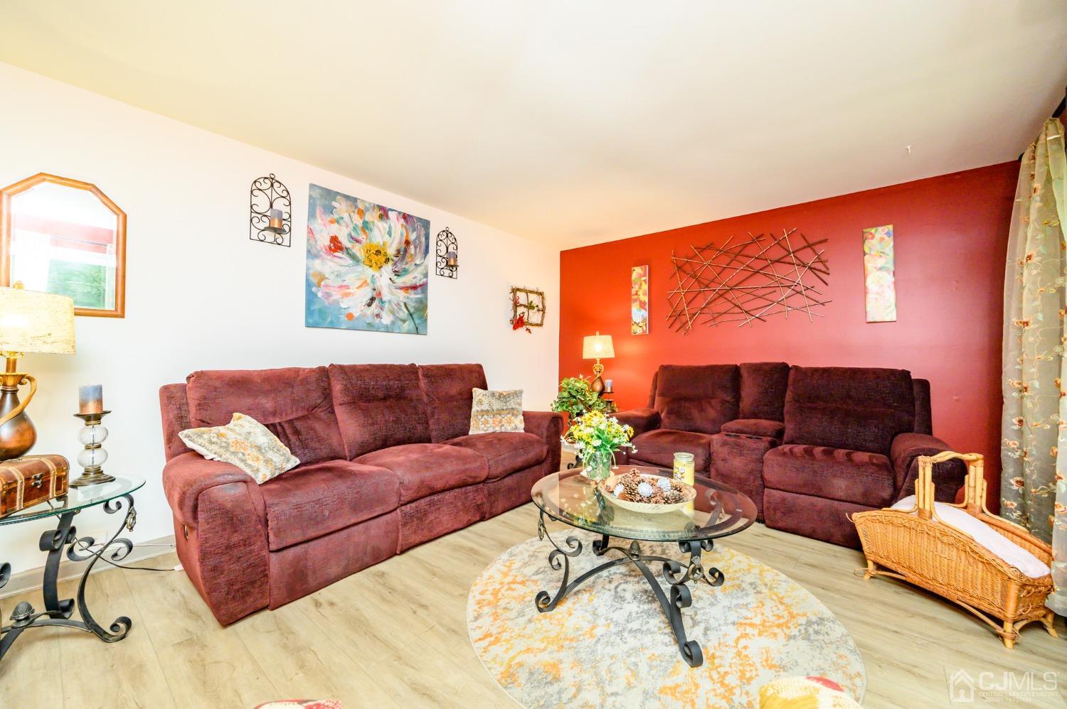67 Hollow Road Glen Gardner, NJ 08826 - Photo 6 of 45 a living room with furniture and a wooden floor