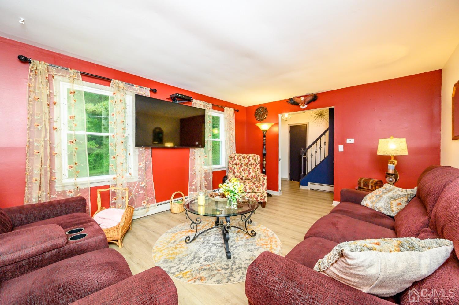 67 Hollow Road Glen Gardner, NJ 08826 - Photo 7 of 45 a living room with furniture and a large window