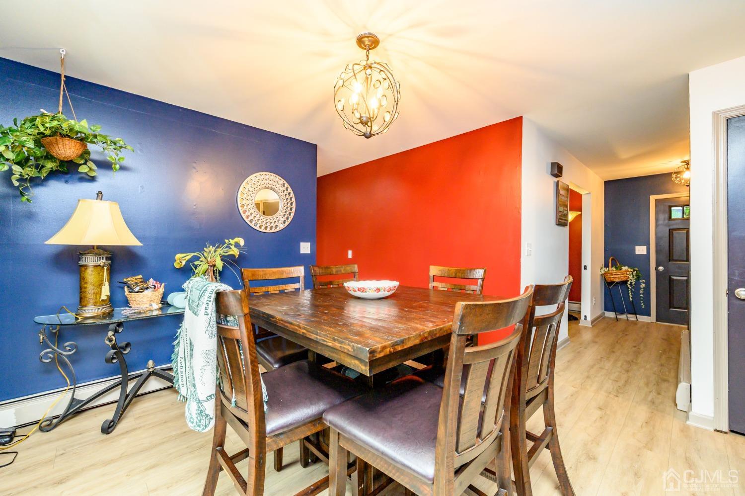 67 Hollow Road Glen Gardner, NJ 08826 - Photo 9 of 45 a view of a dining room with furniture and chandelier