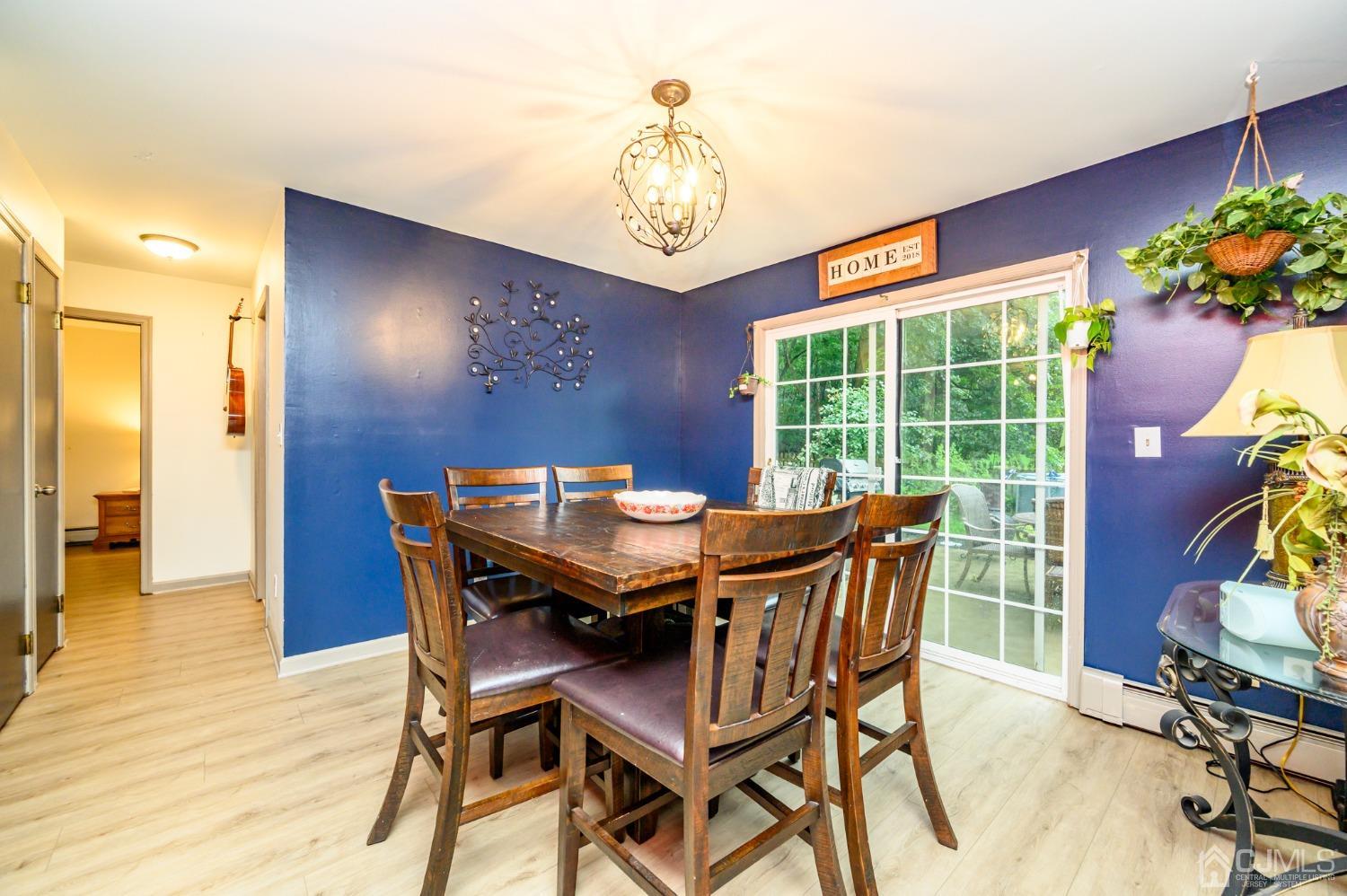 67 Hollow Road Glen Gardner, NJ 08826 - Photo 10 of 45 a view of a dining room with furniture window and wooden floor