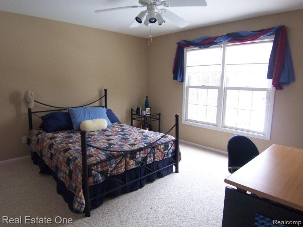 7635 Hunters Pointe Brighton, MI 48116 - Photo 20 of 25 Bedroom 3