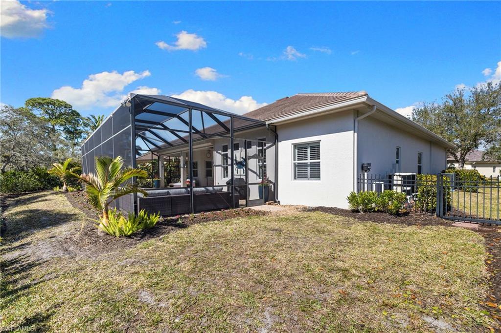 347 Saddlebrook Lane Naples, FL 34110 - Photo 34 of 43 Just had a cold snap and grass froze. It will be back to green soon!