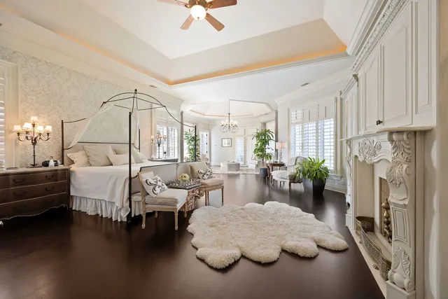 a bed room with furniture and wooden floor