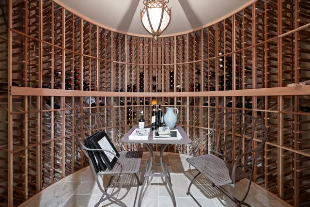 a view of a chairs and table in the back