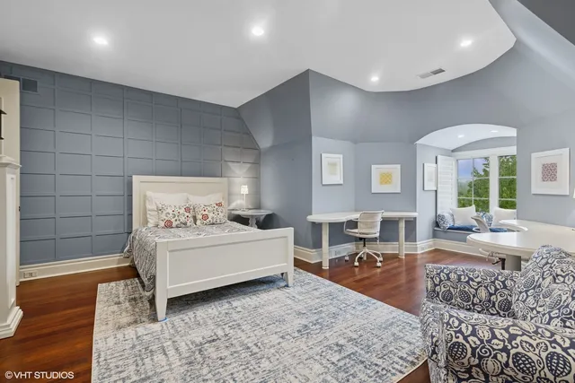 a living room with furniture rug and window