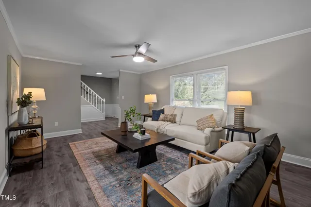 a kitchen with kitchen island granite countertop appliances cabinets and a sink