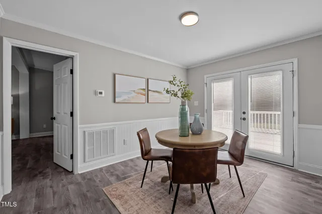 a spacious bedroom with a bed and a window