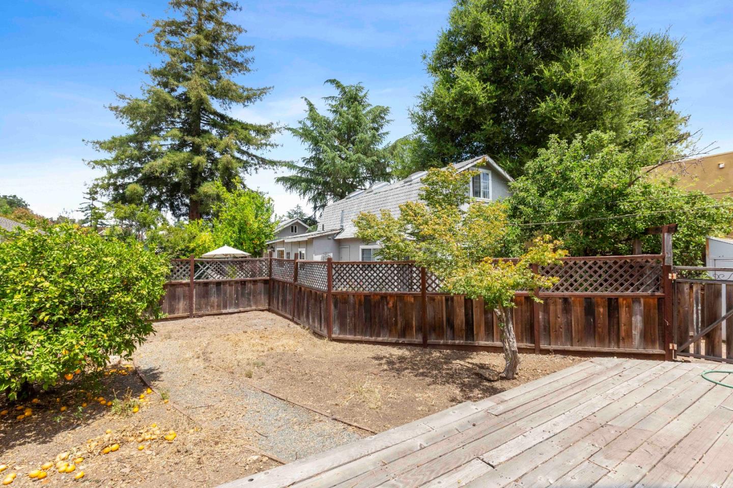 16735 Shannon Road Los Gatos, CA 95032 - Photo 12 of 19 a view of a house with a yard