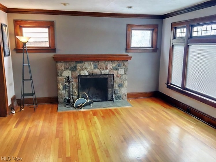 3775 Lowell Road Cleveland Heights, OH 44121 - Photo 3 of 23 Cozy living room with wood-burning fireplace and beautiful hardwood floors.