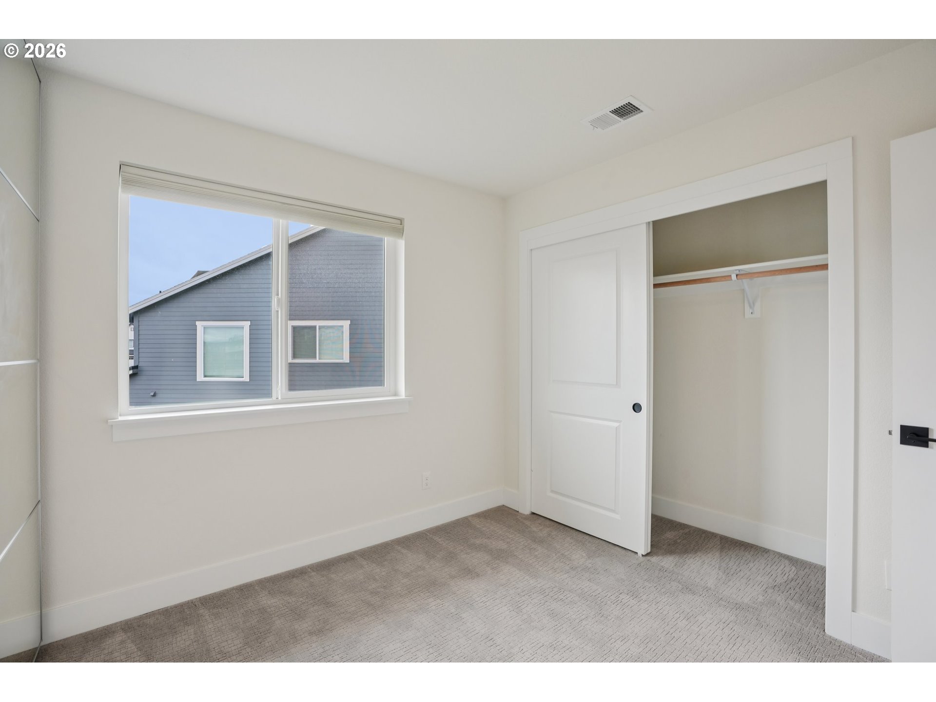 3809 Southeast Reed Drive Hillsboro, OR 97123 - Photo 24 of 40 a room that has a window in it