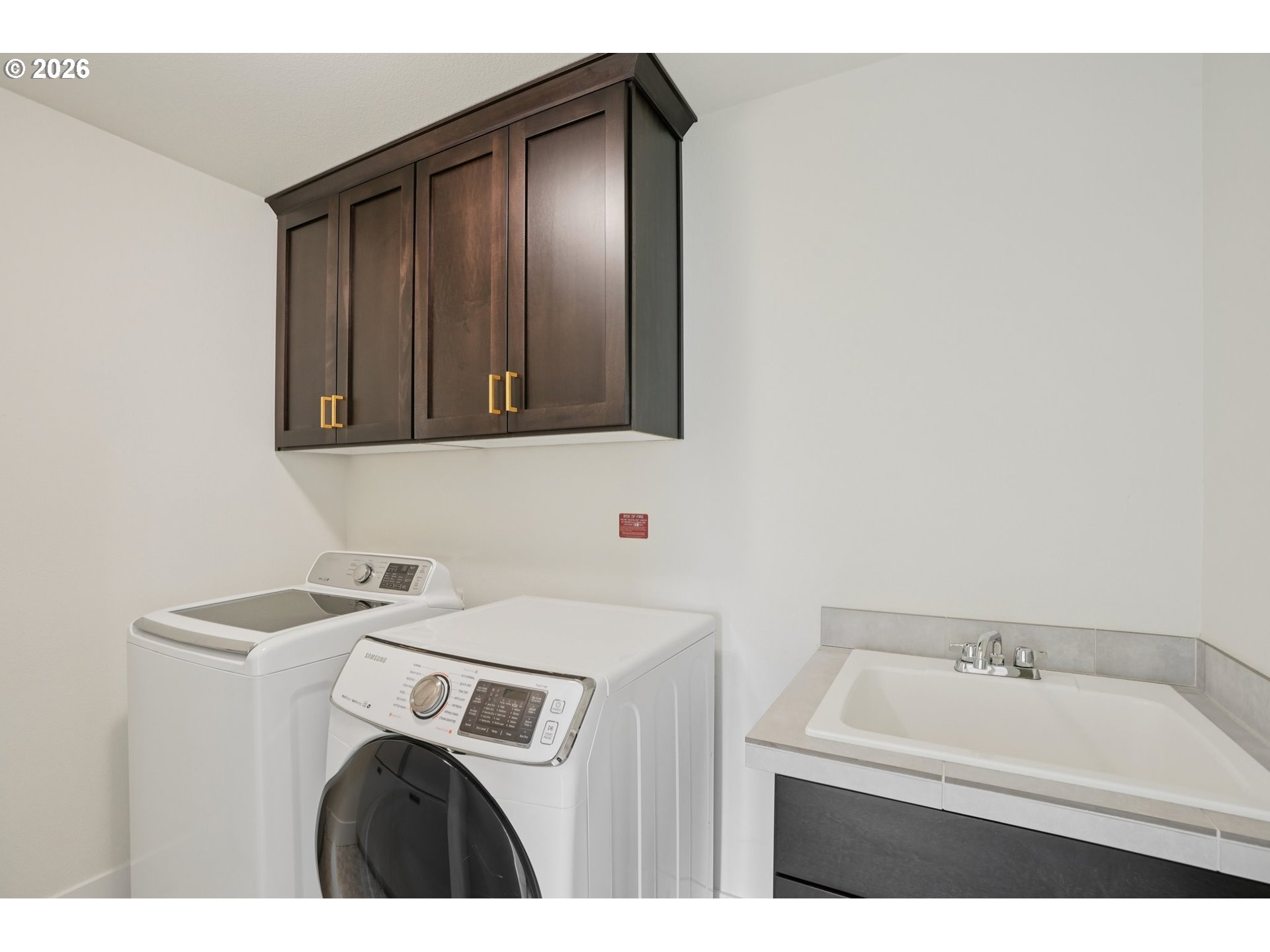 3809 Southeast Reed Drive Hillsboro, OR 97123 - Photo 25 of 40 a utility room with dryer and washer