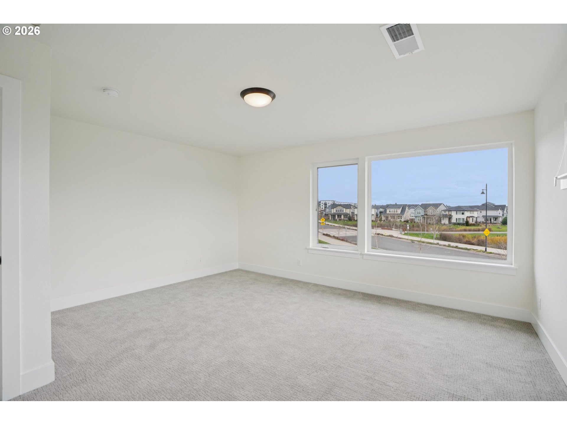 3809 Southeast Reed Drive Hillsboro, OR 97123 - Photo 26 of 40 a view of an empty room with a window