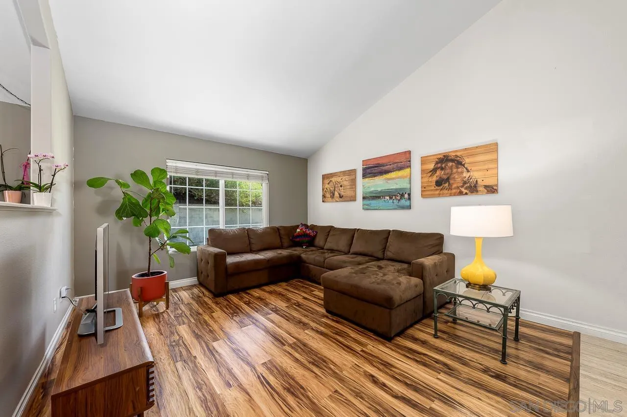 10359 Settle Road Santee, CA 92071 - Photo 10 of 36 a living room with furniture and a window