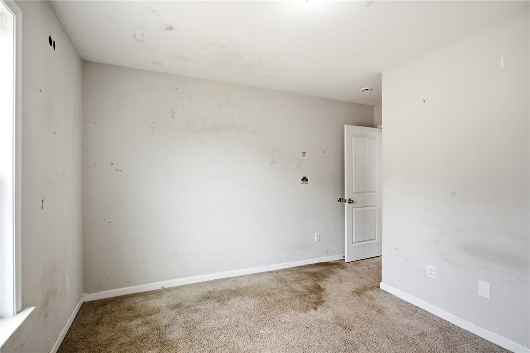 245 Maple Grove Road Seneca, SC 29678 - Photo 29 of 40 This spacious room awaits your personal touch to transform it into a vibrant living space.