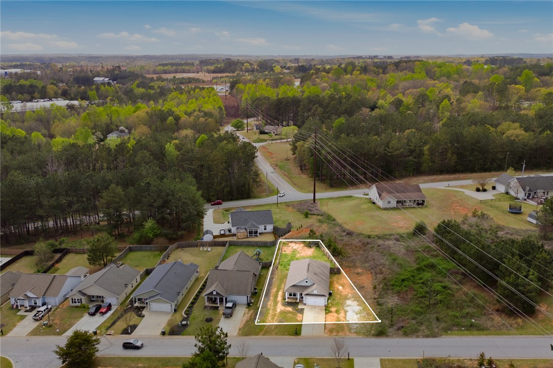 245 Maple Grove Road Seneca, SC 29678 - Photo 36 of 40 This captivating aerial view showcases the property's expansive lot, offering a private setting with abundant outdoor space.