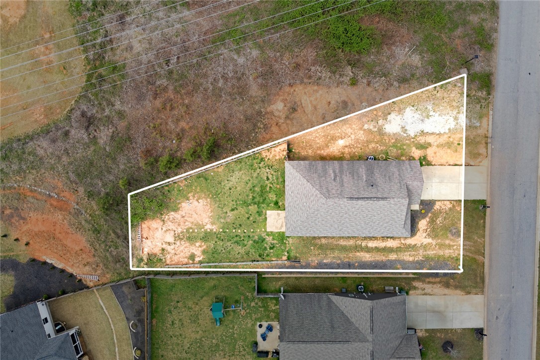 245 Maple Grove Road Seneca, SC 29678 - Photo 38 of 40 An aerial view showcases a residential property with clear boundaries and adjacent structures.