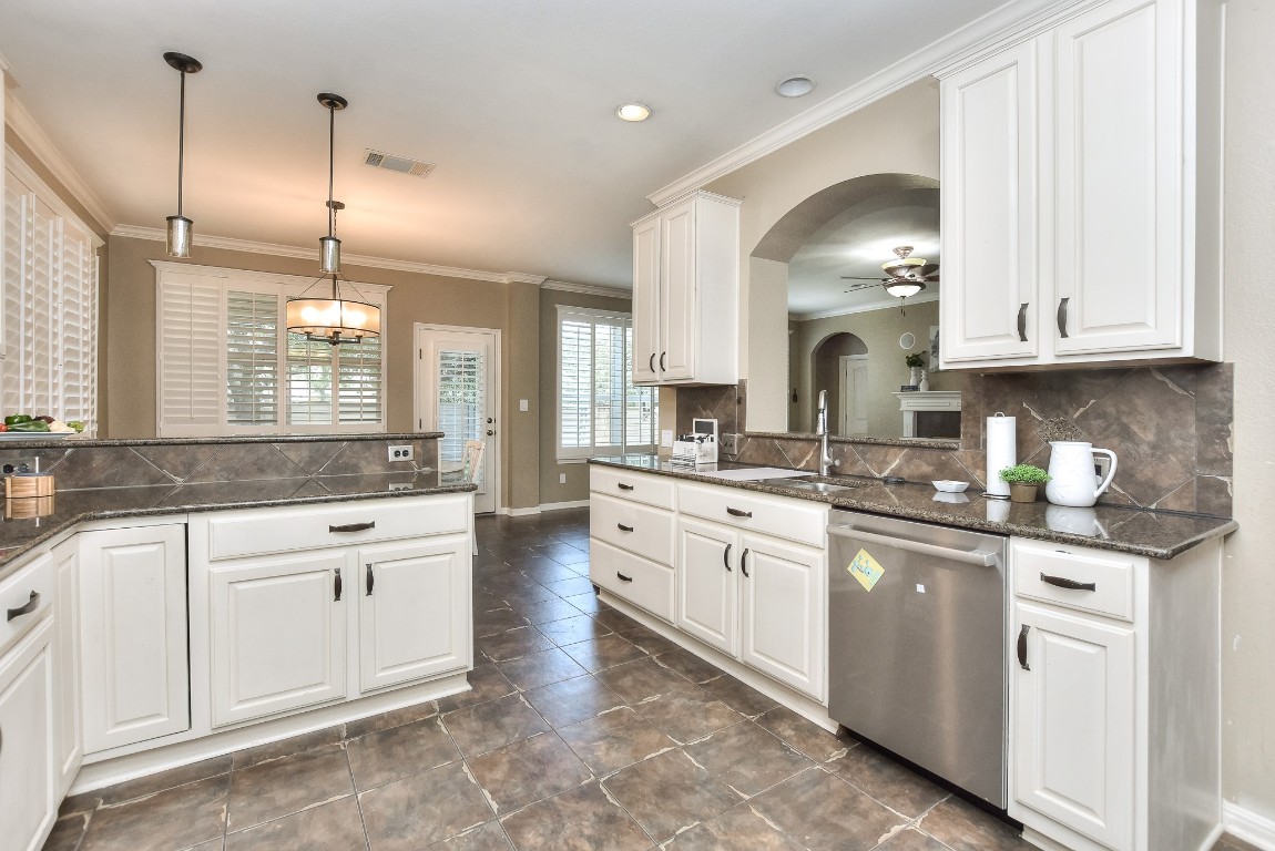 1108 Ritter Drive Cedar Park, TX 78613 - Photo 14 of 40 This kitchen boasts an abundance of cabinets and counter space for meal prep! All lower cabinets have pull out shelves!