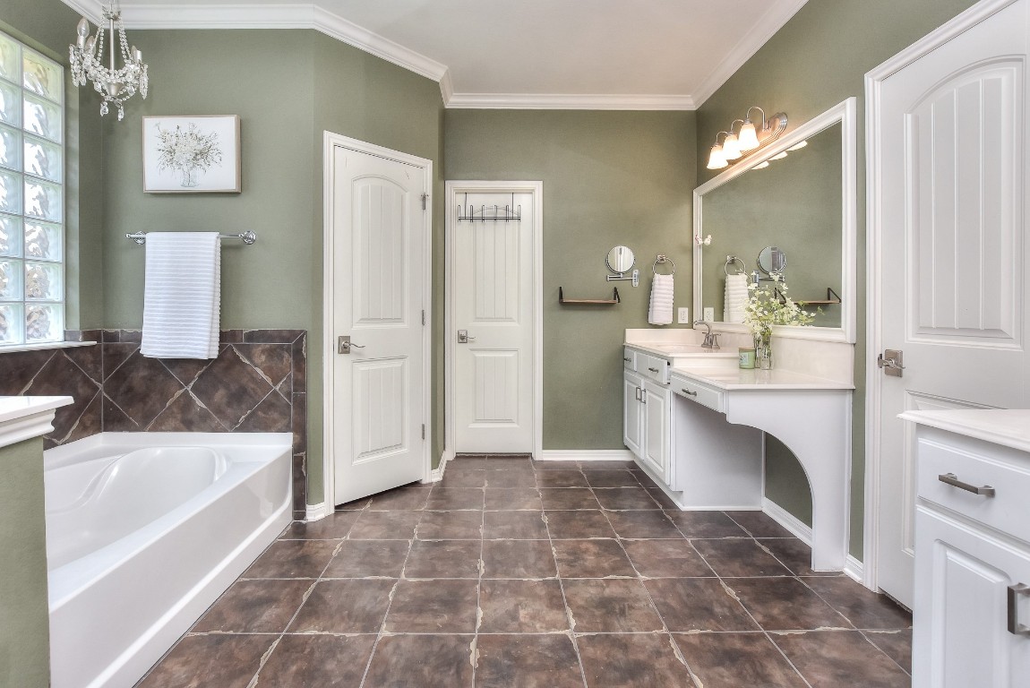 1108 Ritter Drive Cedar Park, TX 78613 - Photo 22 of 40 Inviting primary bathroom with separate vanities, soaking tub, separate shower, and 2 walk-in closets! Bidet in water closet.