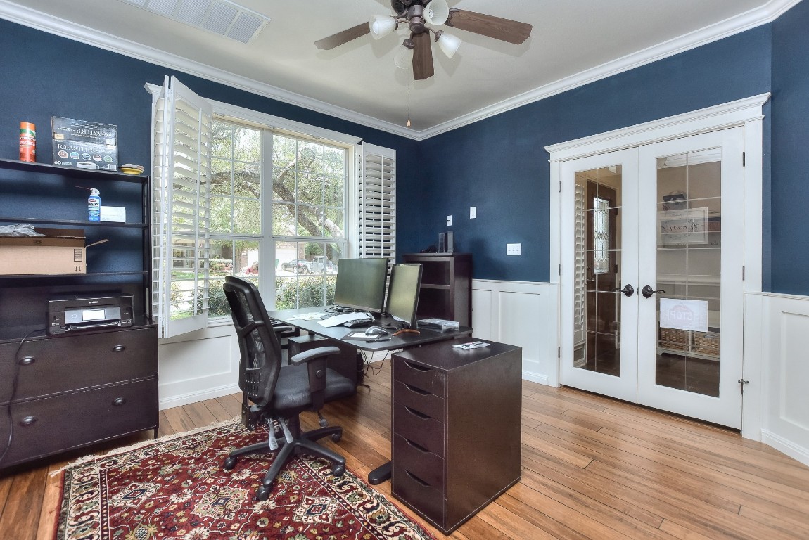 1108 Ritter Drive Cedar Park, TX 78613 - Photo 6 of 40 Nice wood floors, custom paint, plantation shutters and french doors off the entry make this a perfect place to get work done!