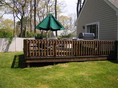 50 Oxner Road Centerville, MA 02632 - Photo 11 of 12 a view of a bench in the garden