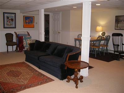 50 Oxner Road Centerville, MA 02632 - Photo 7 of 12 a living room with furniture and a rug