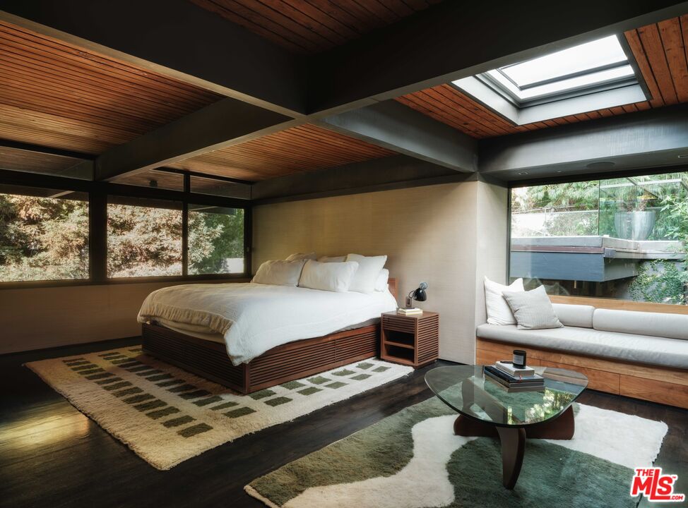 2563 Nichols Canyon Road Los Angeles, CA 90046 - Photo 17 of 32 a living room with furniture and a large window