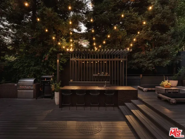 a view of swimming pool with seating space