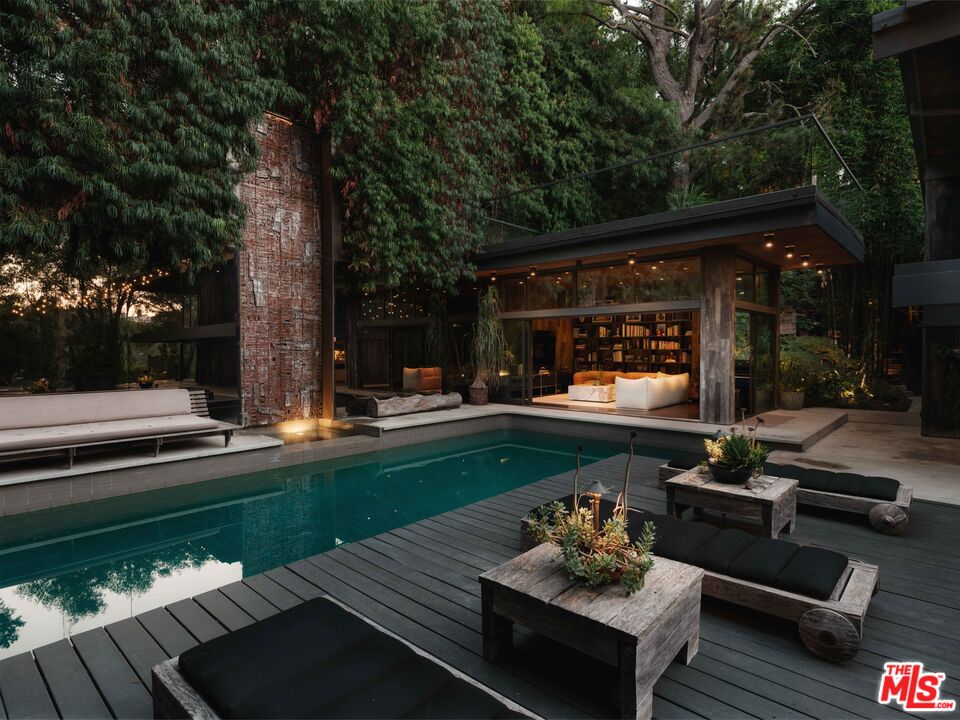 2563 Nichols Canyon Road Los Angeles, CA 90046 - Photo 30 of 32 a outdoor living space with furniture and a garden