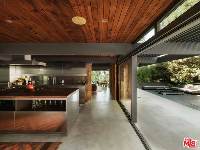 a view of a garage with wooden floor