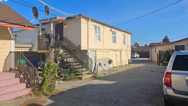 a view of a house with a street