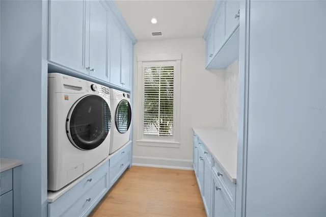 a view of a patio with a table and chairs